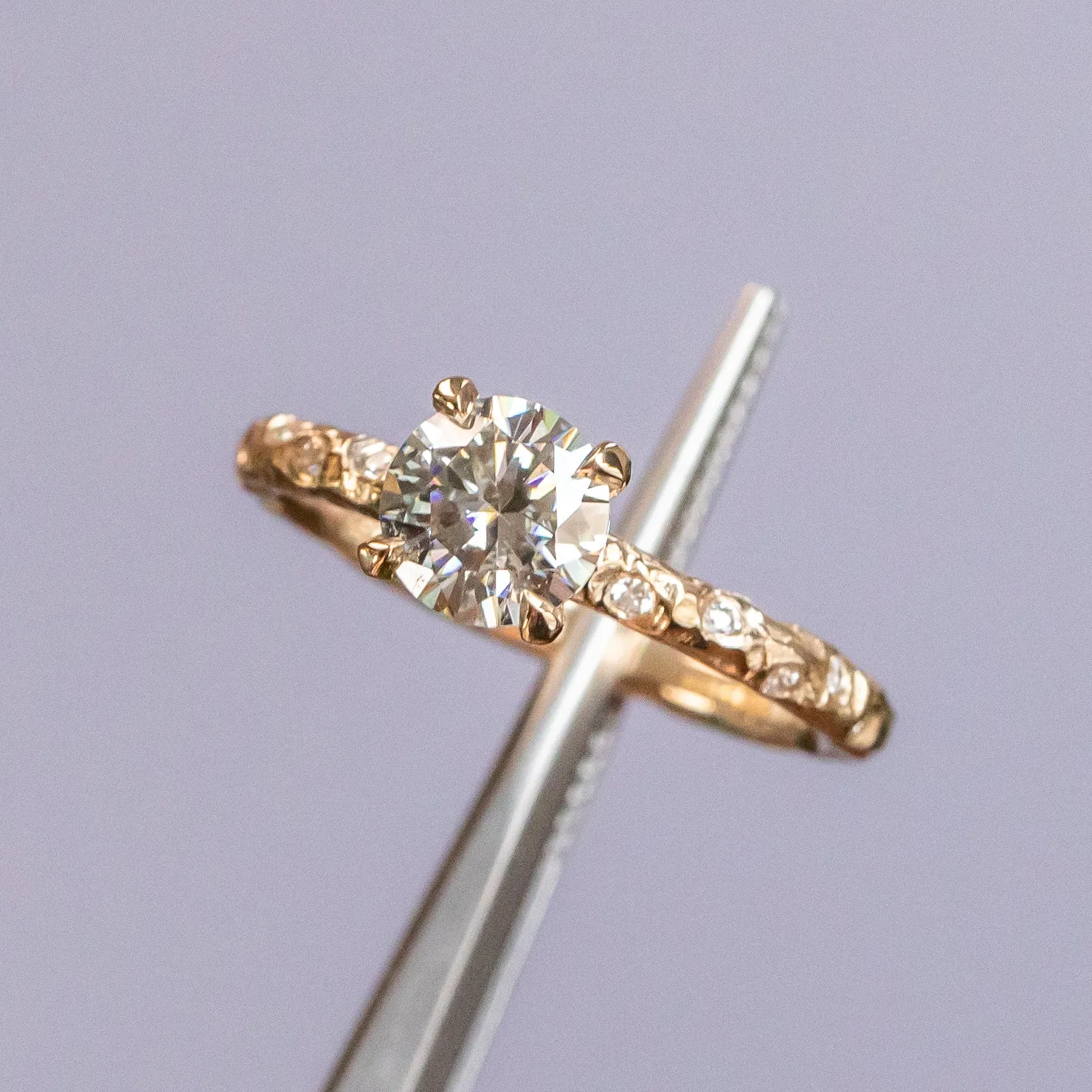 0.90ct Round Grey Moissanite in 14k Yellow Gold Evergreen Solitaire with Scattered Embedded Diamonds