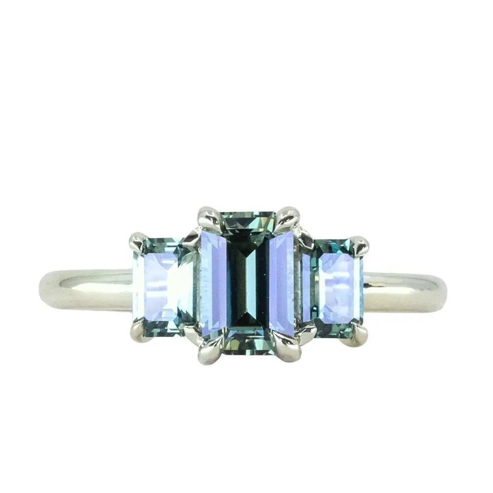 0.95ct Madagascar Emerald Cut and 0.67ctw Montana Sapphire Three Stone Low Profile Ring in 14k Green Gold