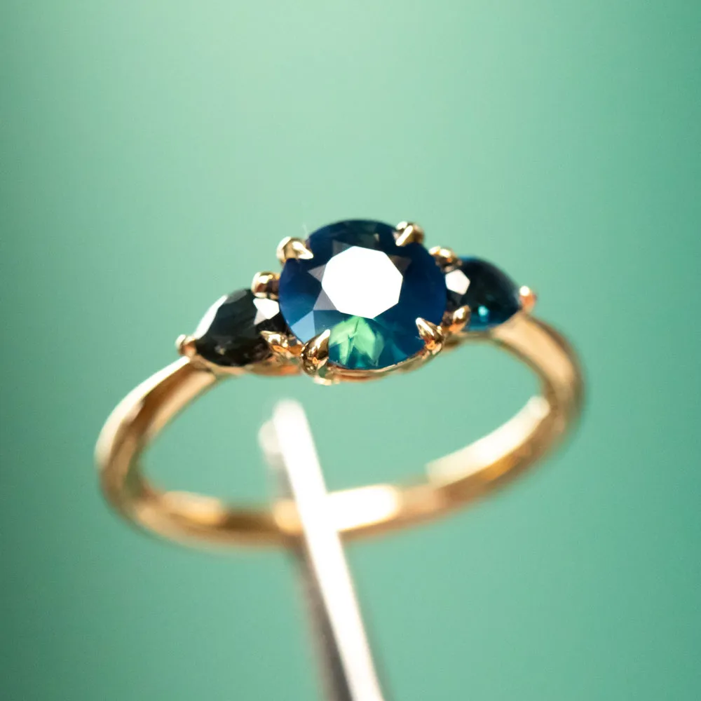 1.03ct Untreated Teal Nigerian Sapphire Three Stone Ring in 18K Yellow Gold