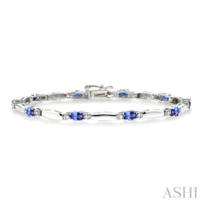 1/10 Ctw Bar and Oval Mount Round Cut Diamond & 5x3MM Oval Cut Tanzanite Precious Bracelet in 10K White Gold