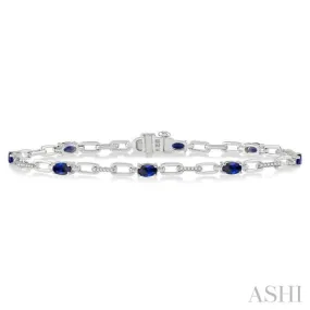 1/6 ctw Round Cut Diamond & 5x3MM Oval Cut Sapphire Precious Bracelet in 10K White Gold