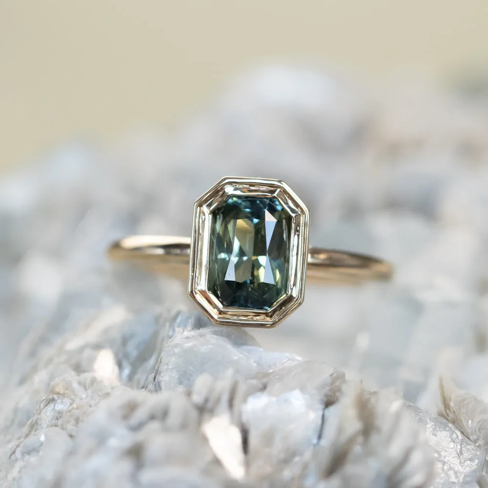 2.05ct Radiant Cut Green Sapphire Low Profile Bezel Hidden Diamond Halo Solitaire Ring in 14k Yellow Gold