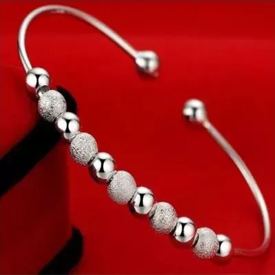 Female's Nine Turns Silver Pearl Bracelet