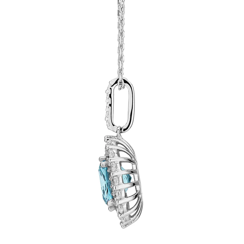 Halo necklace with blue topaz simulant and 0.73 carats* of diamond simulants in sterling silver