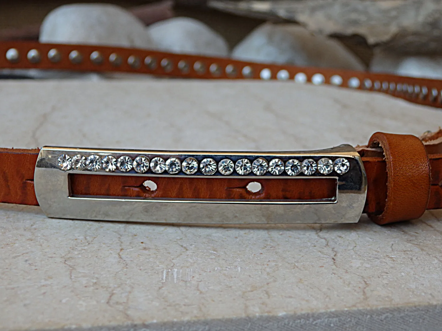 Skinny brown leather belt