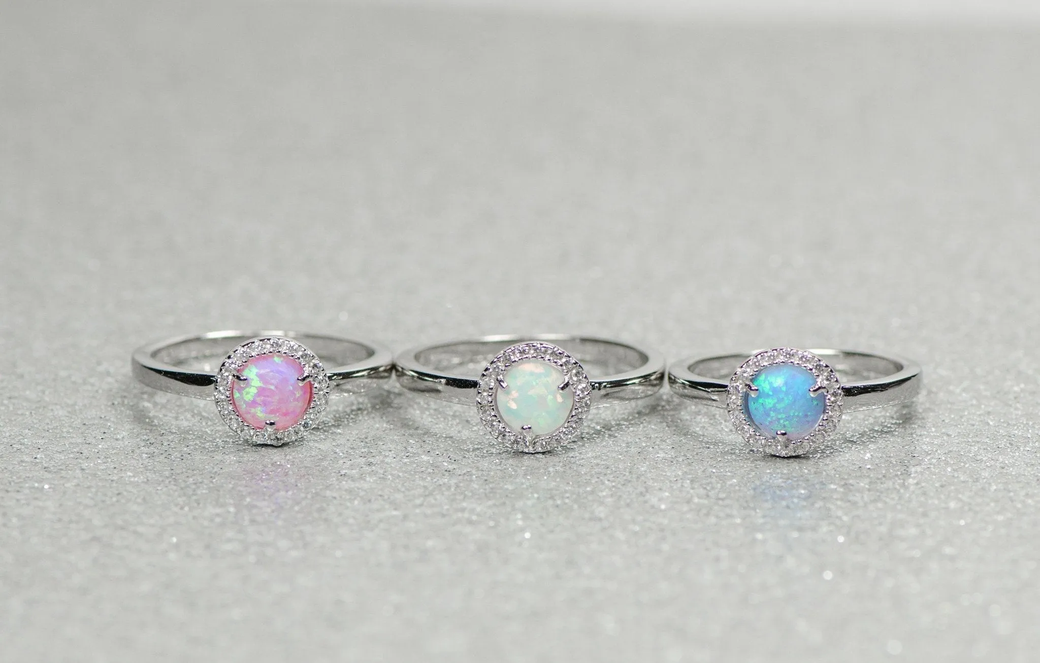 Sterling Silver Light Blue Opal and CZ Halo Ring