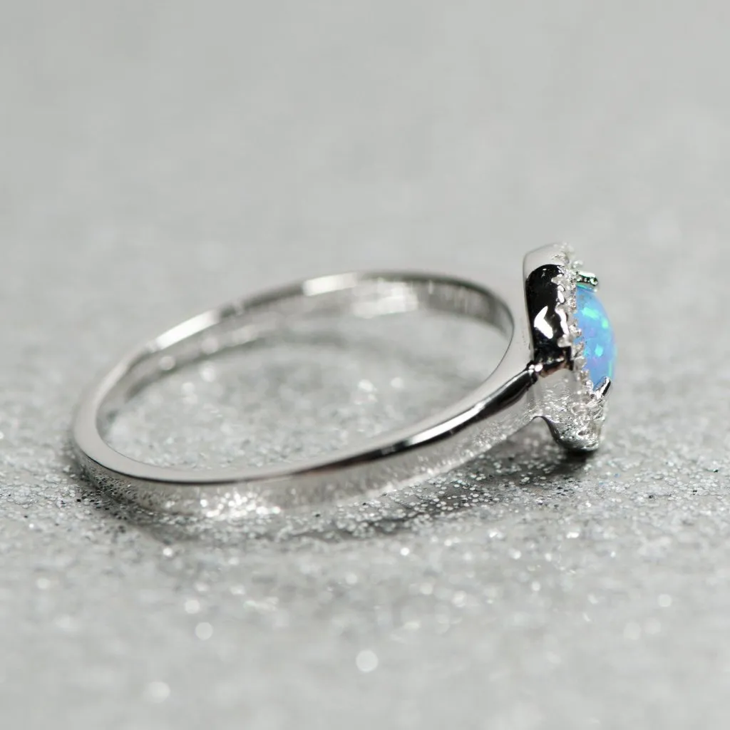 Sterling Silver Light Blue Opal and CZ Halo Ring