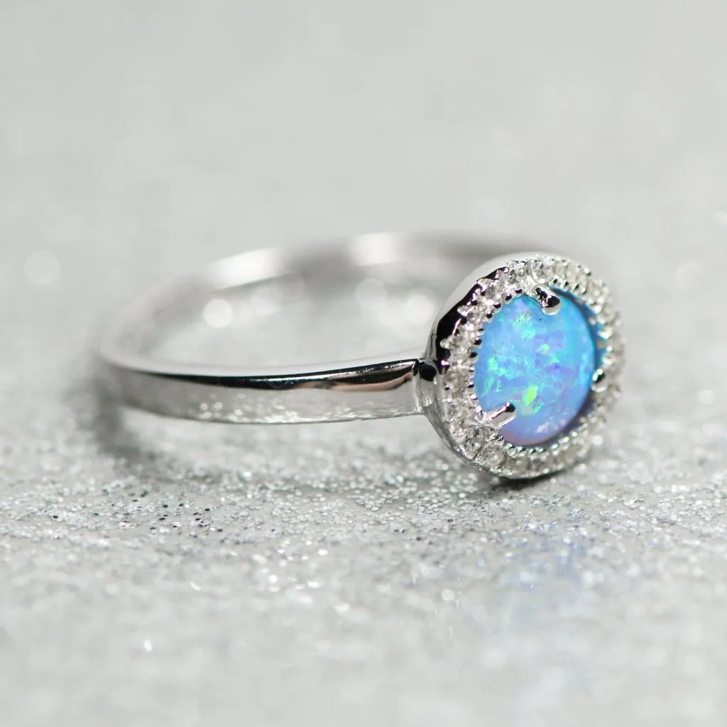 Sterling Silver Light Blue Opal and CZ Halo Ring