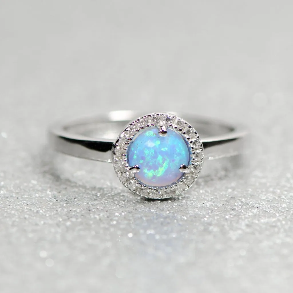 Sterling Silver Light Blue Opal and CZ Halo Ring